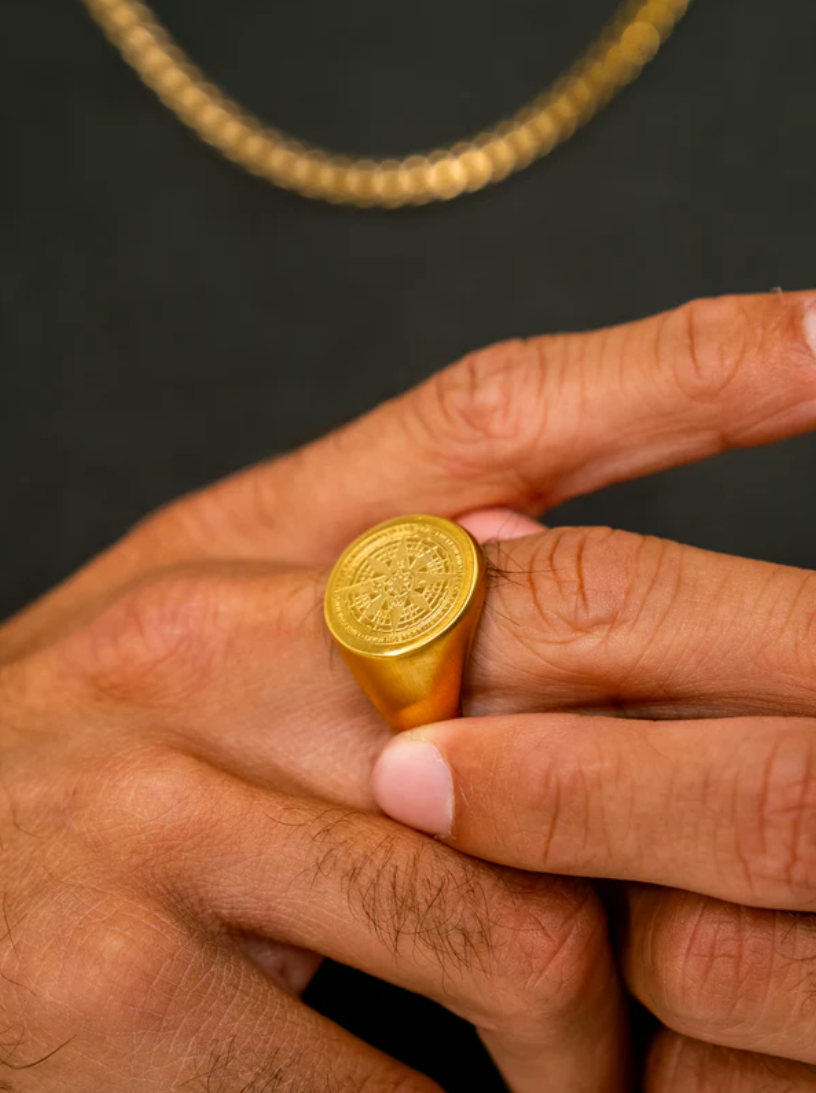 "COMPASS" RING